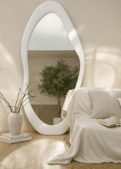 Annabelle wavy mirror in white textured MDF, made in the UAE