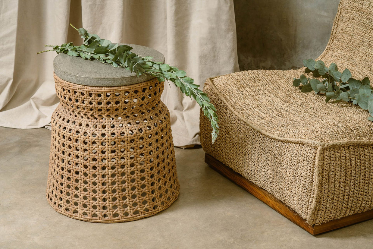 Altos side table in cement and rattan