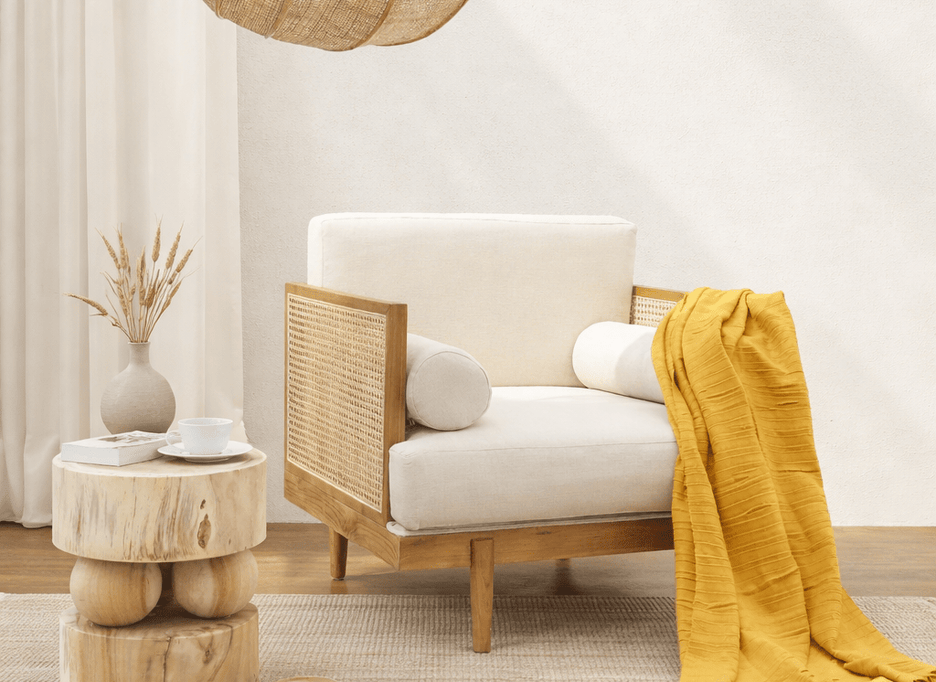 Eloisa teak sofa with rattan side panels and side bolster