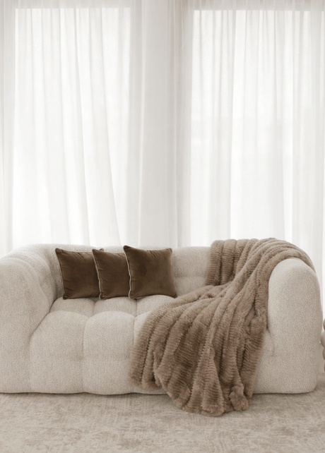 Ashley Cloud sofa with soft curves and plush cushioning