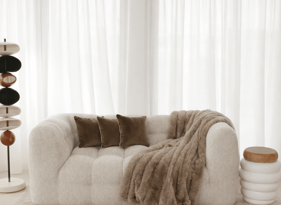 Ashley Cloud sofa with soft curves and plush cushioning
