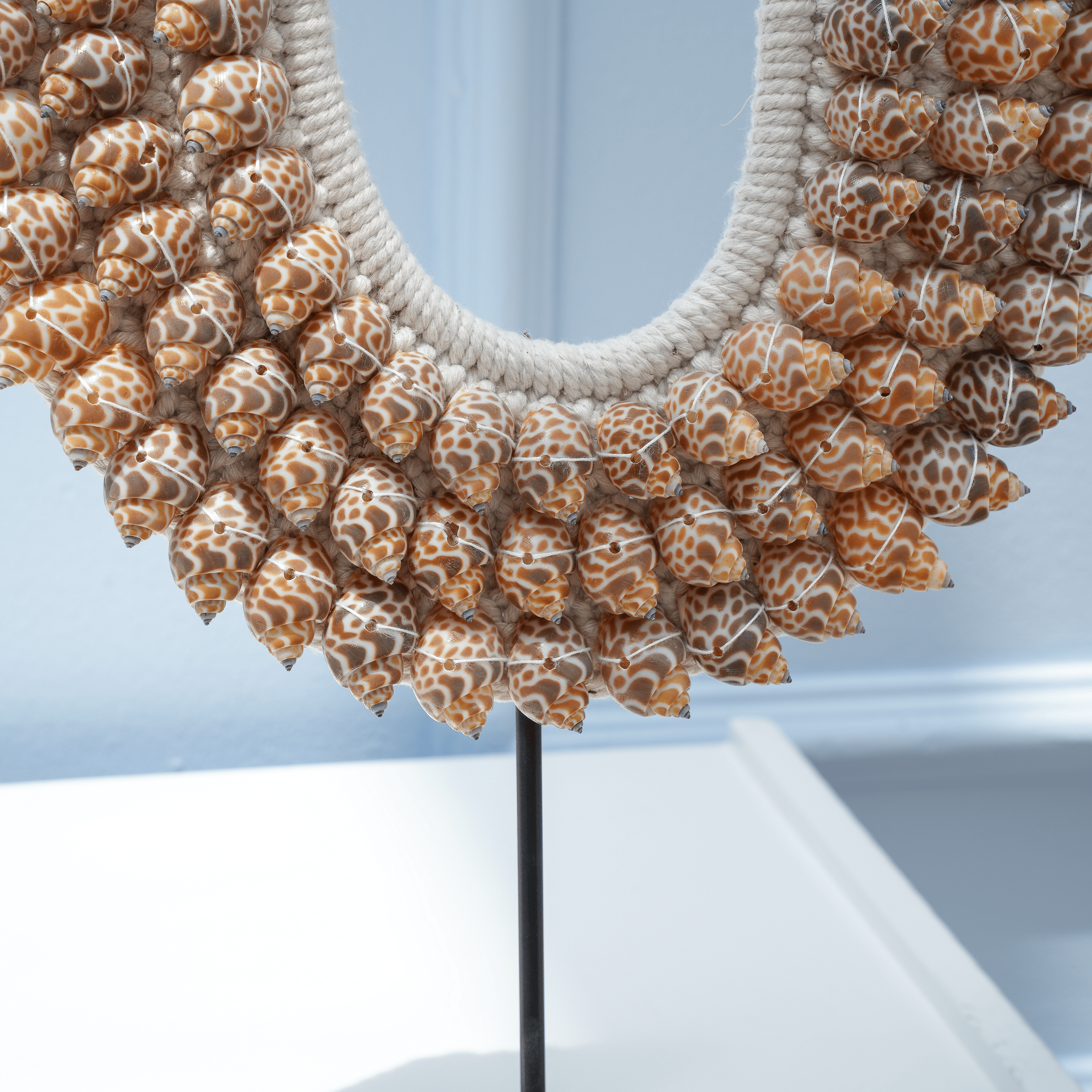 SHELL NECKLACE ON STAND