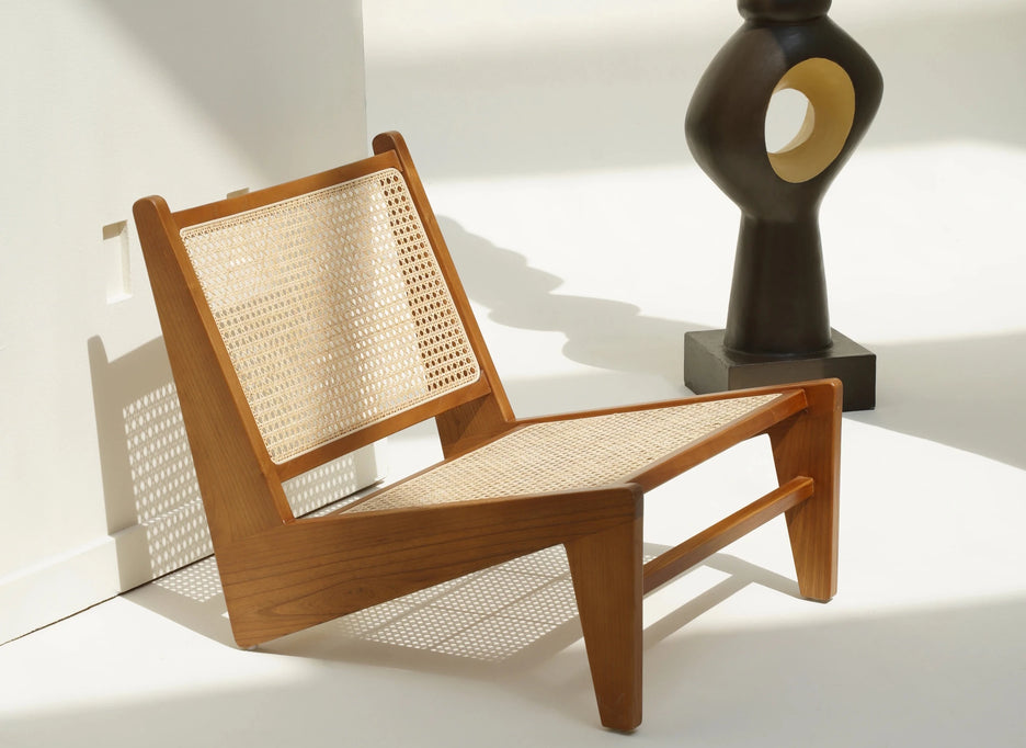Sukhna low lounge chair in teak wood with rattan weave
