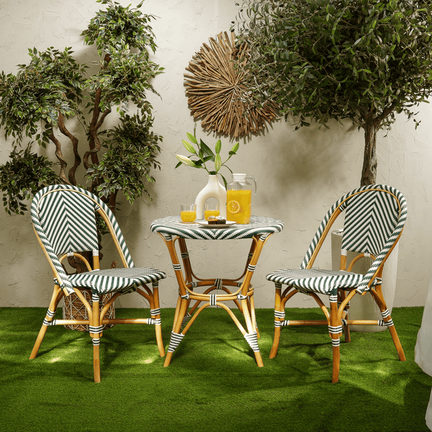 Modern round garden table with cane frame  
