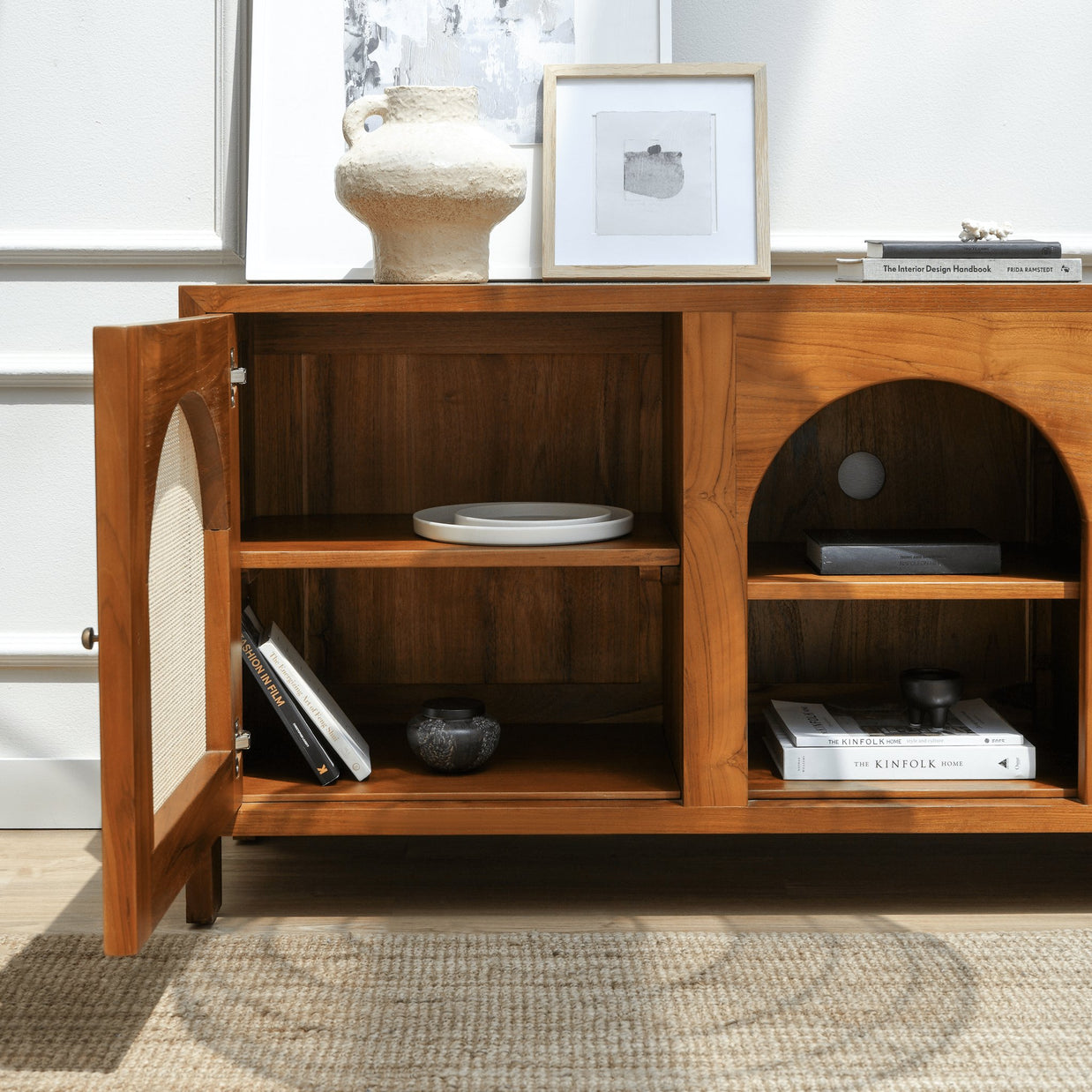Elegant teak TV console with soft-close rattan mesh doors