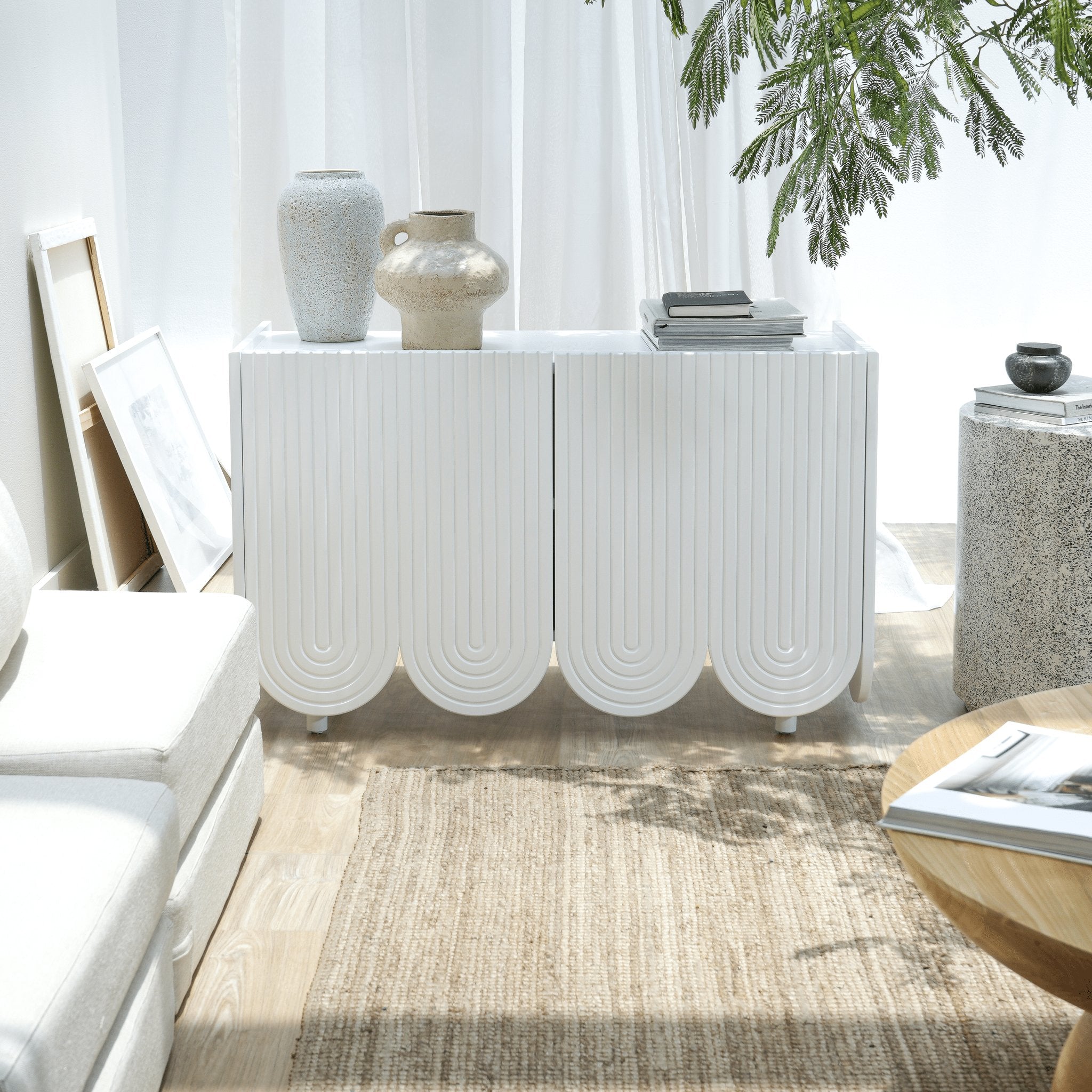 Freya TV console with curved design and contemporary white finish