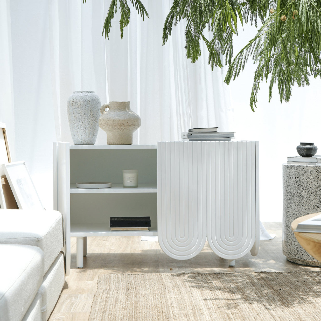 Freya TV console with curved design and contemporary white finish