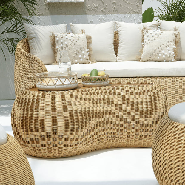 Teak wood coffee table with rattan wrapped base