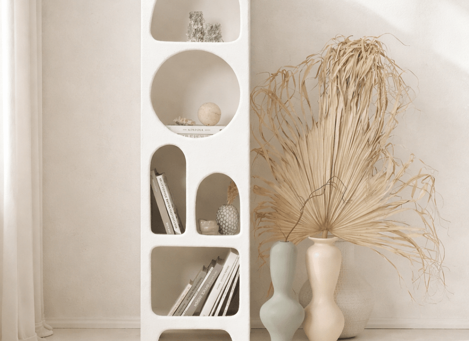 Isabelle bookshelf with textured white finish and cave-like shelves
