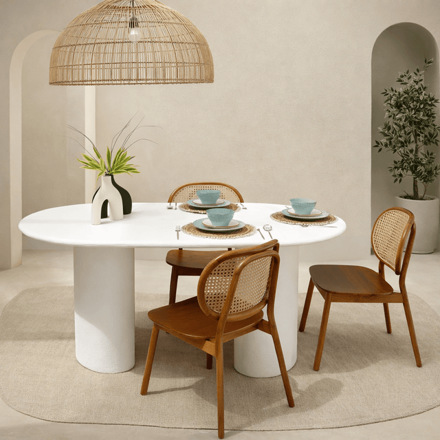 Annabelle oval dining table in micro cement with textured finish