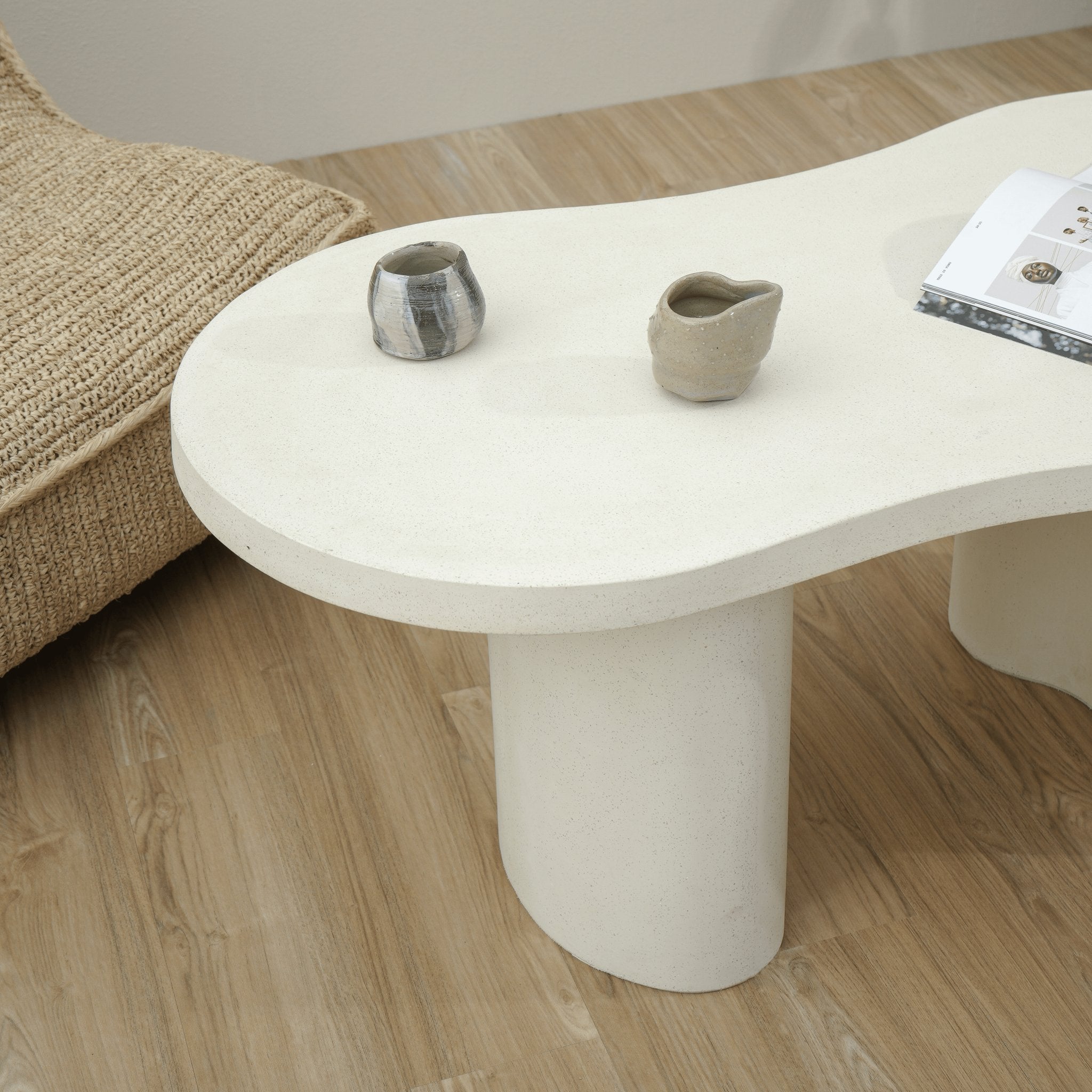Modern GRC coffee table with sculptural column legs